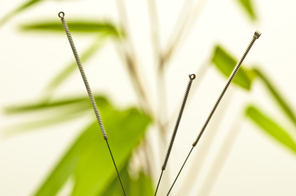 Bild Akupunkturnadeln und Bambus